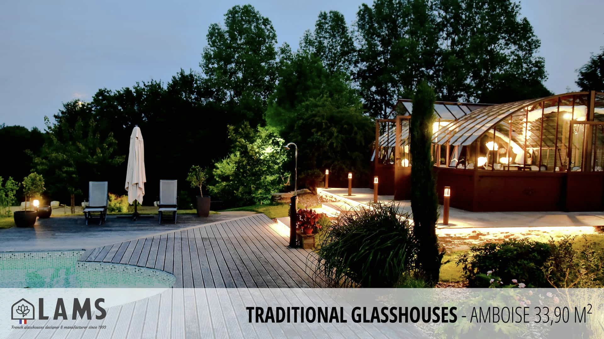 A serene garden scene with a wooden deck, pool, lounge chairs, and a glasshouse, surrounded by trees and soft evening lighting.