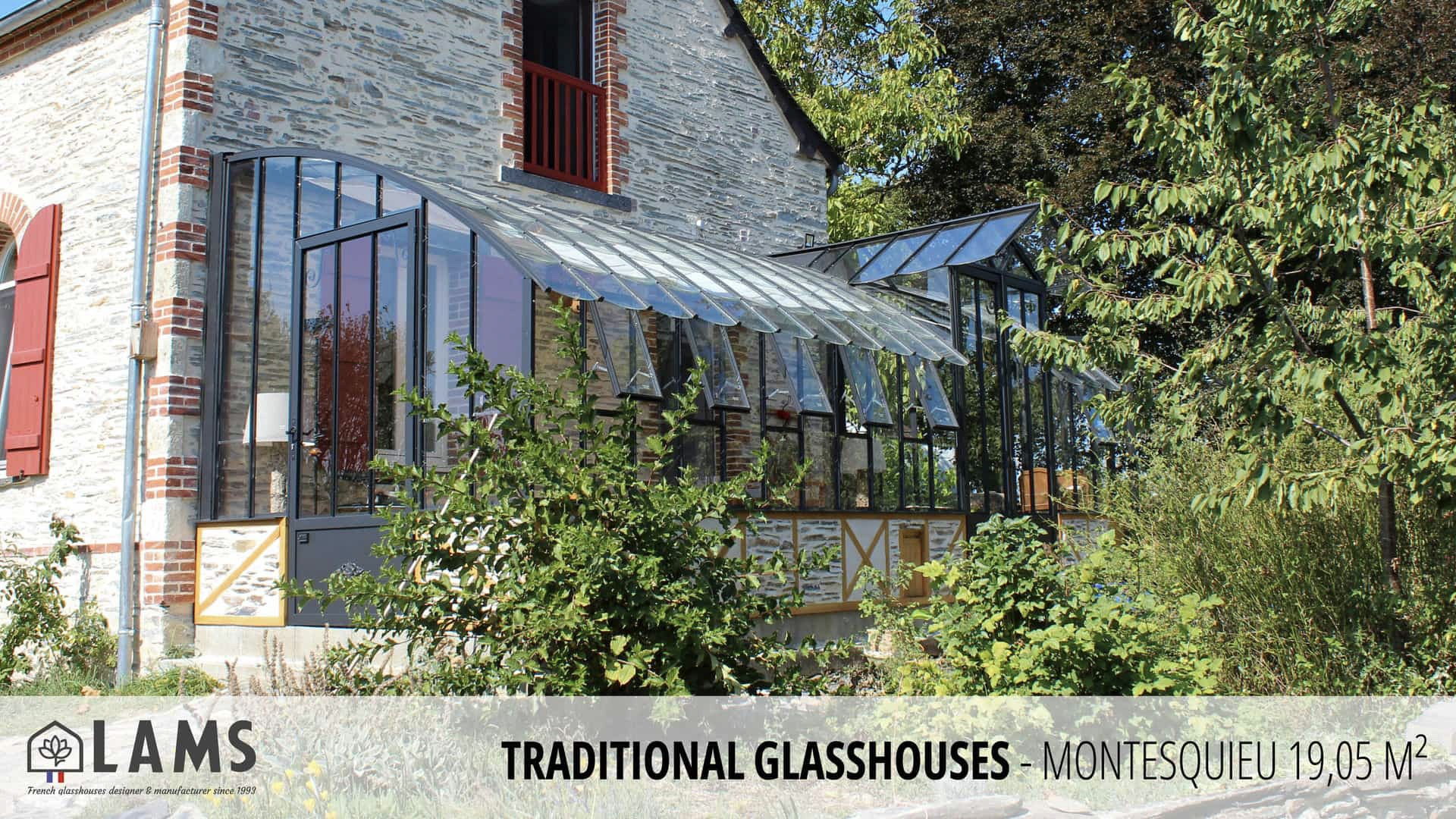 A rustic house with a glasshouse extension surrounded by greenery. The design features traditional architectural elements. No recognizable landmarks or historical buildings.
